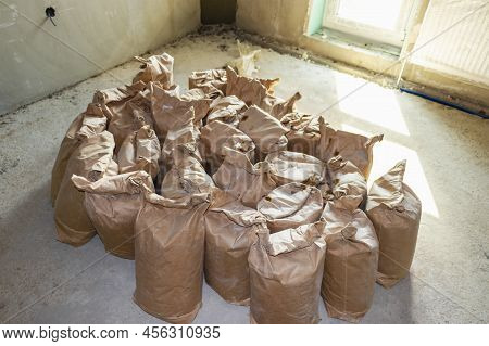 Cement Bagbuilding Mix Bags. Delivery Of Cement And Plaster For Works. Paper Bags With Cement And Bu