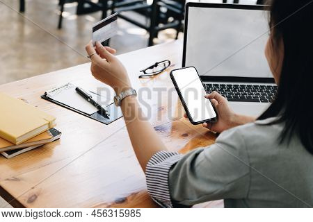Online Shopping And Internet Payments, Asian Wonam Are Using Their Mobile Phone And Credit Card To S