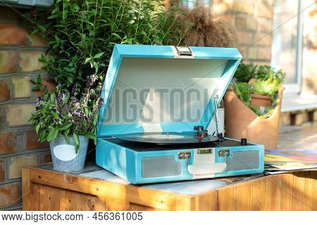 Vinyl Blue Record Player At Home. Modern Phonograph Record Concept In Trendy Colors. Stylish Record 