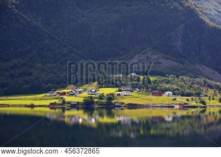 Vanylvsfjorden Fiord In Norway. Norwegian Fiord Sunlight Village Landscape.