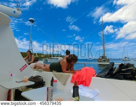The People At Snorkeling Underwater And Fishing Tour By Boat At The Caribbean Sea At Honeymoon Beach