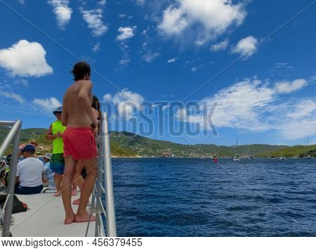 The People At Snorkeling Underwater And Fishing Tour By Boat At The Caribbean Sea At Honeymoon Beach
