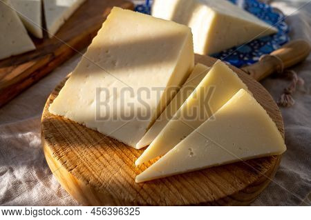 Spanish Hard Manchego, Cow, Sheep And Goat Cheese Served Outdoor In Morning Sunlights