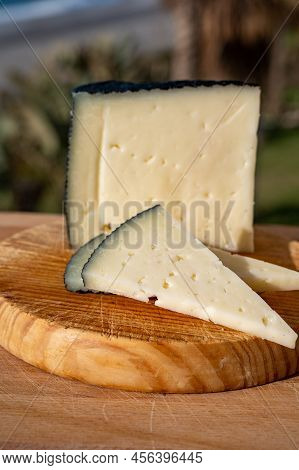 Spanish Hard Manchego, Cow, Sheep And Goat Cheese Served Outdoor In Morning Sunlights