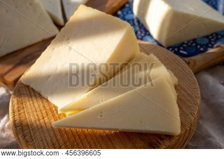 Spanish Hard Manchego, Cow, Sheep And Goat Cheese Served Outdoor In Morning Sunlights