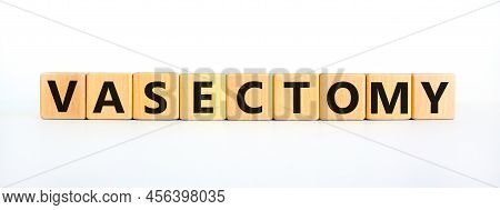 Vasectomy Symbol. Concept Words Vasectomy On Wooden Blocks. Beautiful White Table White Background. 