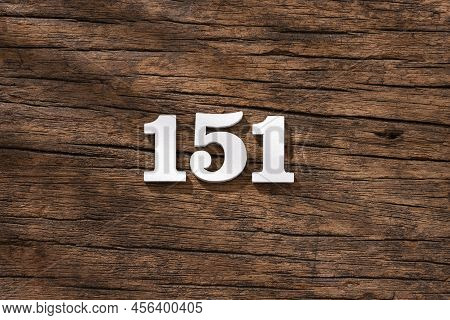 Number 151 - Piece On Rustic Wood Background