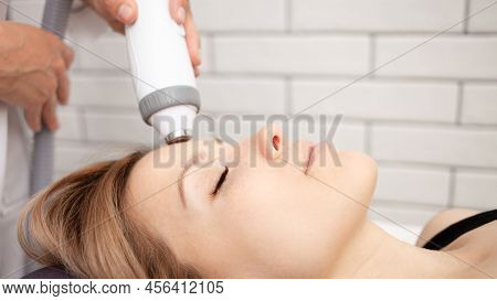 Cosmetologist Does Rf Lifting, Radio Waves Affect Skin, Facelift, Rejuvenation And Healing. Healthy 
