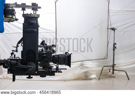Movie Shooting Or Video Production And Film Crew Team With Camera Equipment. Video Camera Operator W