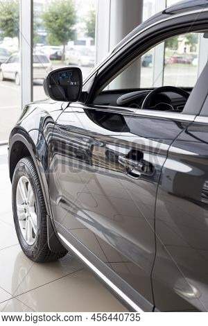 Russia, Izhevsk - August 14, 2020: Geely Showroom. New Modern Atlas Car In Dealer Showroom. Side Vie