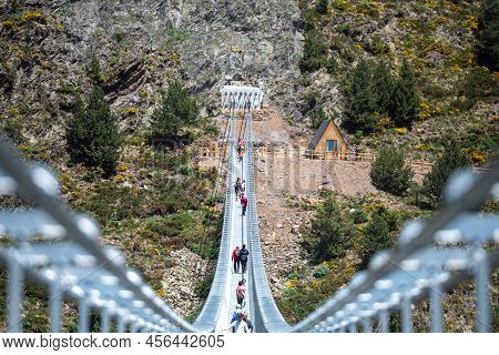 Canillo, Andorra. 2022 June 9. People Walking On The Longest Tibetan Bridge In Europe, 600 Meters Lo