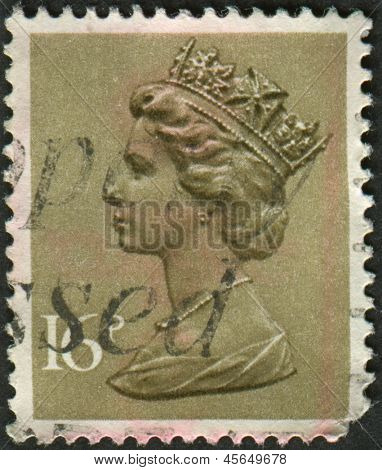 UK-CIRCA 1983: et frimærke, trykt i UK viser billede af Elizabeth II er den forfatningsmæssige monark af 16