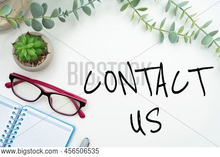 Handwriting Text Contact Us. Business Concept Group Of Person That Rendering Costumer Service Throug