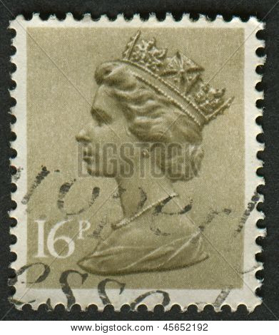 UK-CIRCA 1983: et frimærke, trykt i UK viser billede af Elizabeth II er den forfatningsmæssige monark af 16