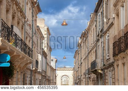 Typical Old French Residential Buildings In Bordeaux, France, Made Of Freestone, Hosting Flats, With
