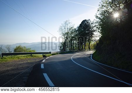 Sharp Turn On Mountain Asphalt Road In Genoa Province, Liguria, Italy. Mountain Road With Beautiful 
