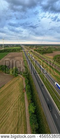 Brecht, Belgium, 16th Of May, 2022, Panoramic Aerial Drone View Of Wind Farm Or Wind Park, With High