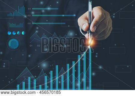 Businessman Working With Modern Computer Virtual Dashboard Analyzing Finance Sales Data And Economic