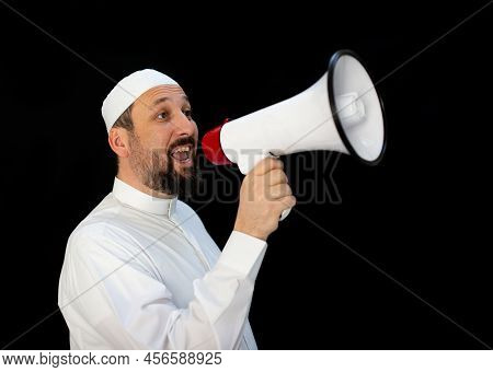 Handsome Man With Beard Shouting Through Megaphone For Hajj In Mekkah