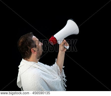 Handsome Man With Beard Shouting Through Megaphone For Hajj In Mekkah