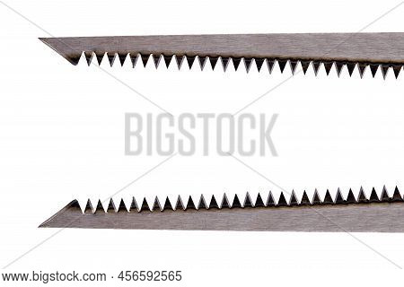 Close Up Of Two Straight Metal Saw Blades One Above And One Below Copy Space With Sharp Long Teeth A