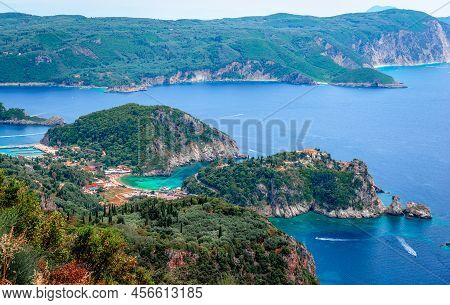 Scenic Landscape Of The Paleokastritsa Era, In Corfu, Greece, With Crystal Clear Water And Rocky Cov