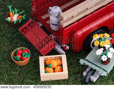 Tambov, Russian Federation - January 02, 2022 A Lego Pickup Truck With Milk Bucket In Its Bed, Some 