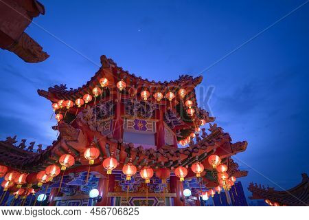 Kuala Lumpur, Malaysia - Feb 6th, 2022: Lighted Red Lanterns Hanging On A Pavilion At Thean Hou Temp