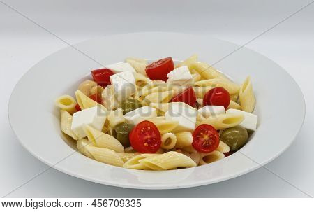 Italian Summer Salad Pasta Fredda. Fresh And Healthy Summer Salad On White Background.