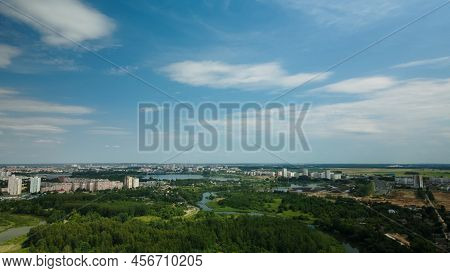 Flight Over The City Park. You Can See Park Buildings. Aerial Photography.