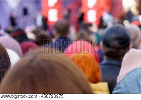 Crowd Of People At The Selective Focus Street Rock Concert. Defocus Crowd Of People