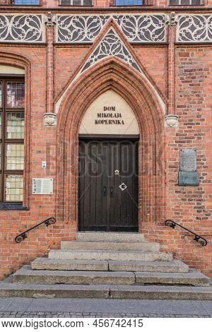 Nicholas Copernicus House (15th Century). Torun, Poland. Polish Text - Nicholas Copernicus House
