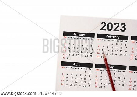 Close-up Of Pencil On Calendar 2023. Close Up Of Pencil On Calendar On White Using As Writing Agenda