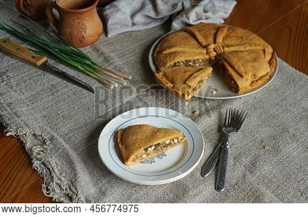 A Piece Of Empanada Gallega - Traditional Pie Stuffed With Tuna. Tart With Tuna And Vegetables.