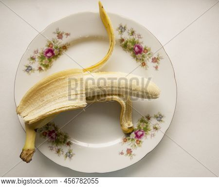Banana Bunch And Peeled Pieces  Photo Tropical Fruits, Banana Snack Or Vegetarian Nutrition.  Top Vi