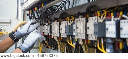 Electricity And Electrical Maintenance Service, Engineer Using Measuring Equipment Tool Checking Ele