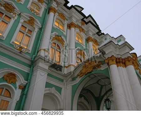 Hermitage Museum Or Winter Palace In Saint-petersburg. Burning Windows On A Twilight Day.