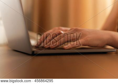 Female Hands Typing Numbers On Laptop. Investment Analysis, Trading Concept. Technology, Digitalizat