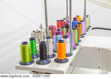Threads Of Different Colors In The Embroidery Shop