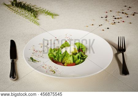 Fresh Vegetable Salad With Spices And Yogurt. Serving The Dish On The Table And Decorating On A Whit