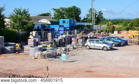 Prestatyn, Uk. Jun 22, 2022. Building Materials Stored Beside Temporary Container Stores And Offices