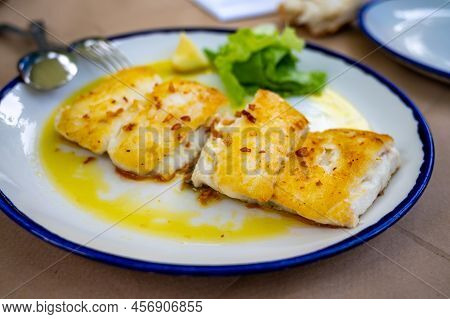 Grilled Fillet Of White Codfish Served In Fish Restaurant In San Sebastian, Basque Country, Spain