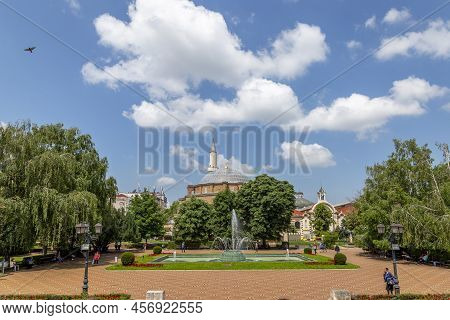 Sofia, Bulgaria - June 14: Pedestrians Pass Through Banski Square In Front Banya Bashi Mosque In Sof