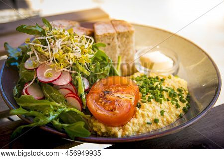 Healthy Vegan Breakfast. Scrambled Tofu As Egg Replacement With Tomato, Salad, Radish And Bread And 