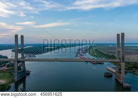 Aerial View Of The Cochrane Bridge Over The Mobile River On The Alabama Gulf Coast At Sunset