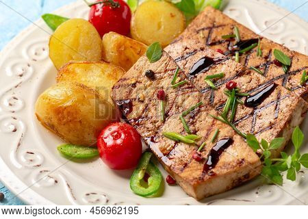 Tofu Steaks With Vegetables Close Up.
