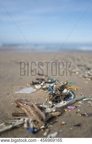 Plastic Waste And Micro Plastic Washed On The Shore Of The Atlantic Ocean