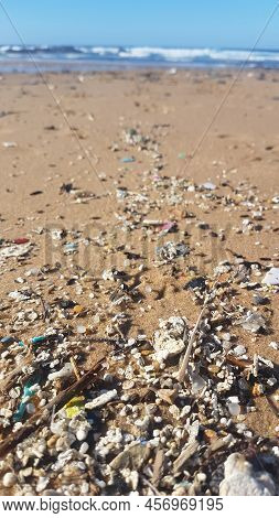 Plastic Waste And Micro Plastic Washed On The Shore Of The Atlantic Ocean