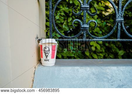 Moscow. Russia. June 22, 2022. Empty Paper Coffee Cup With Kfc Fast Food Restaurant Logo. A Used Pap