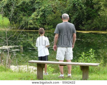 Boy Fishing With Grandfather